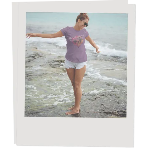 Women on a beach modeling a campy souvenir T-shirt from Kaspers Tees.